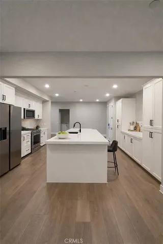 a view of kitchen with wooden floor