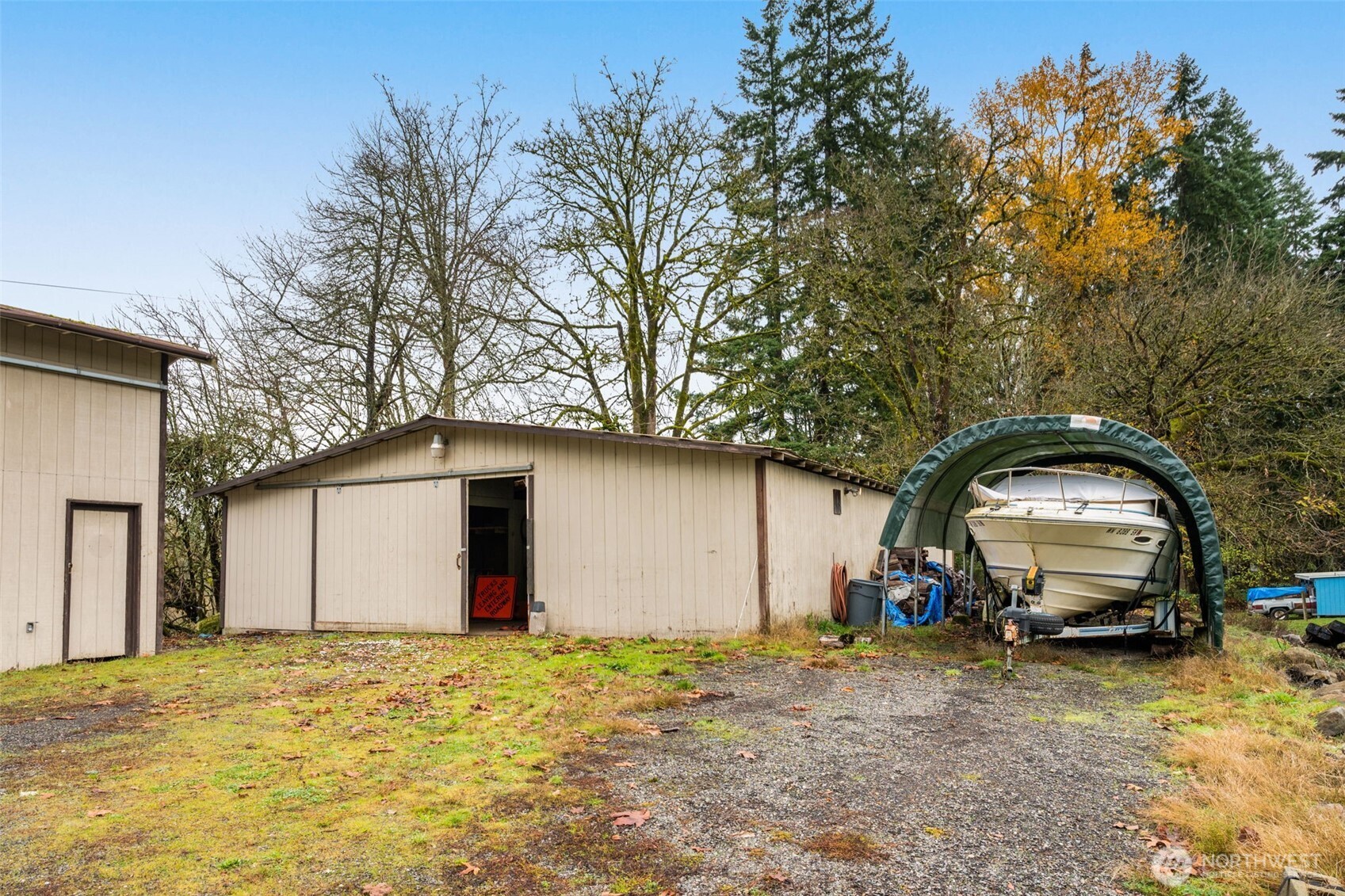 28624 168th Avenue Southeast Kent, WA 98042 - Photo 24 of 31 a front view of a house with a yard and garage