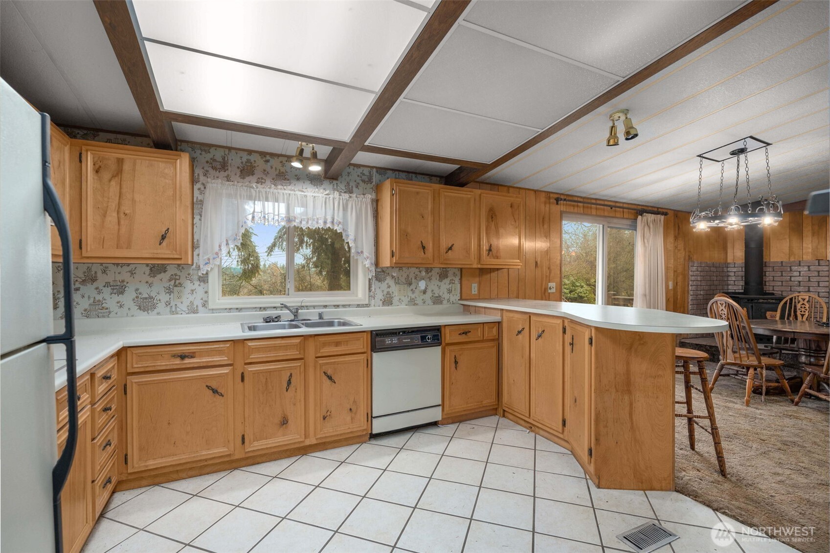 28624 168th Avenue Southeast Kent, WA 98042 - Photo 8 of 31 a kitchen with a sink and cabinets