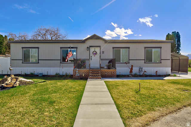 502 West 725 North Logan, UT 84321 - Photo 1 of 25 Manufactured / mobile home with a front lawn