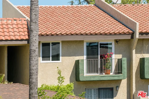 a front view of a house with a porch
