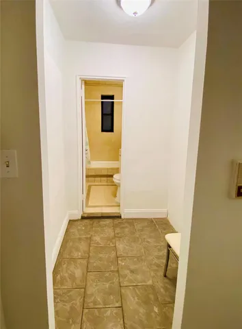 a view of a room with a sink