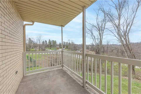 a view of a balcony with lake view
