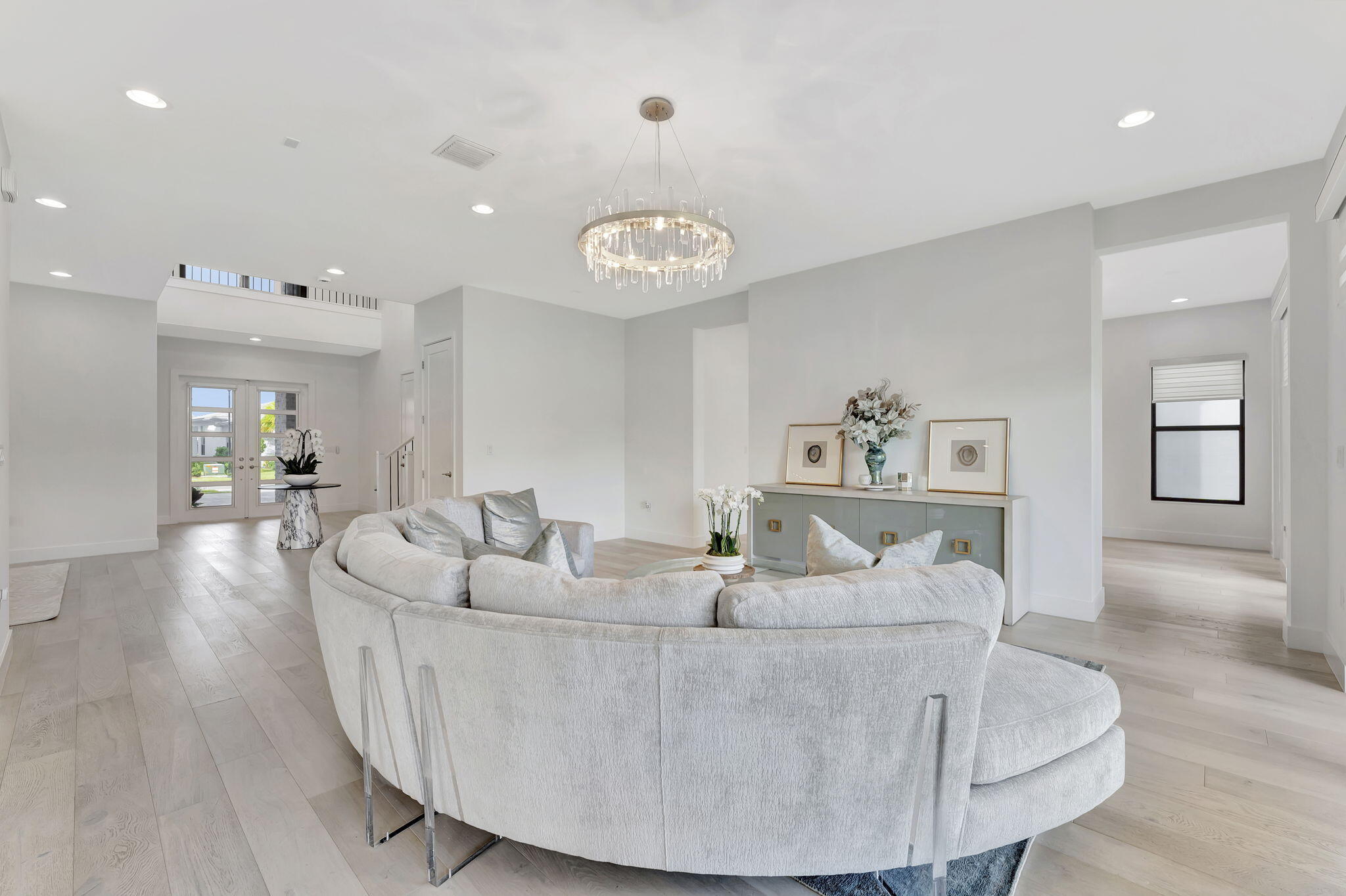 20046 Pacific Dunes Drive Boca Raton, FL 33434 - Photo 12 of 130 a living room with furniture and wooden floor