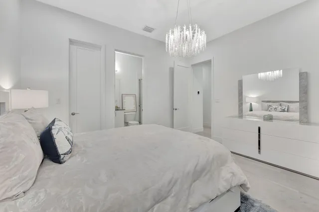 a view of a multi story building with a yard