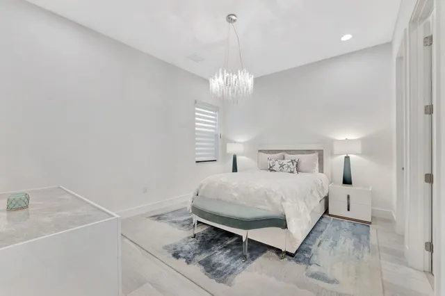 a view of a dining area with furniture window and wooden floor