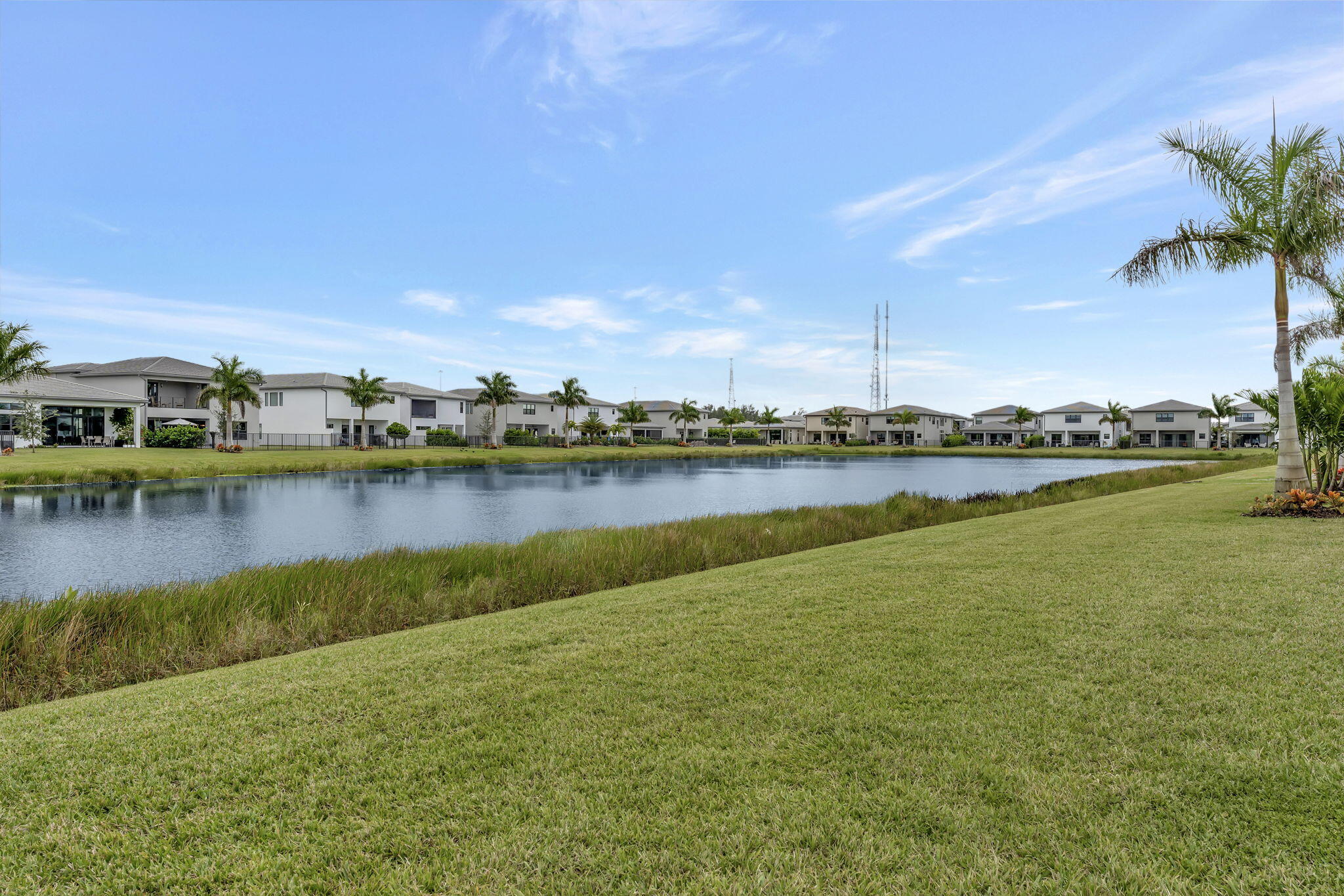 20046 Pacific Dunes Drive Boca Raton, FL 33434 - Photo 45 of 130 a view of a lake with houses in the background