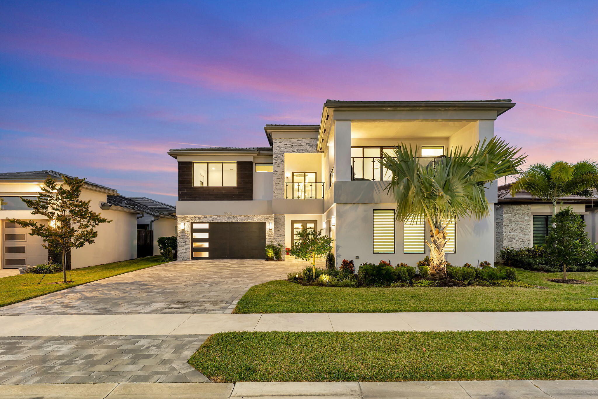 20046 Pacific Dunes Drive Boca Raton, FL 33434 - Photo 62 of 130 a front view of a house with garden