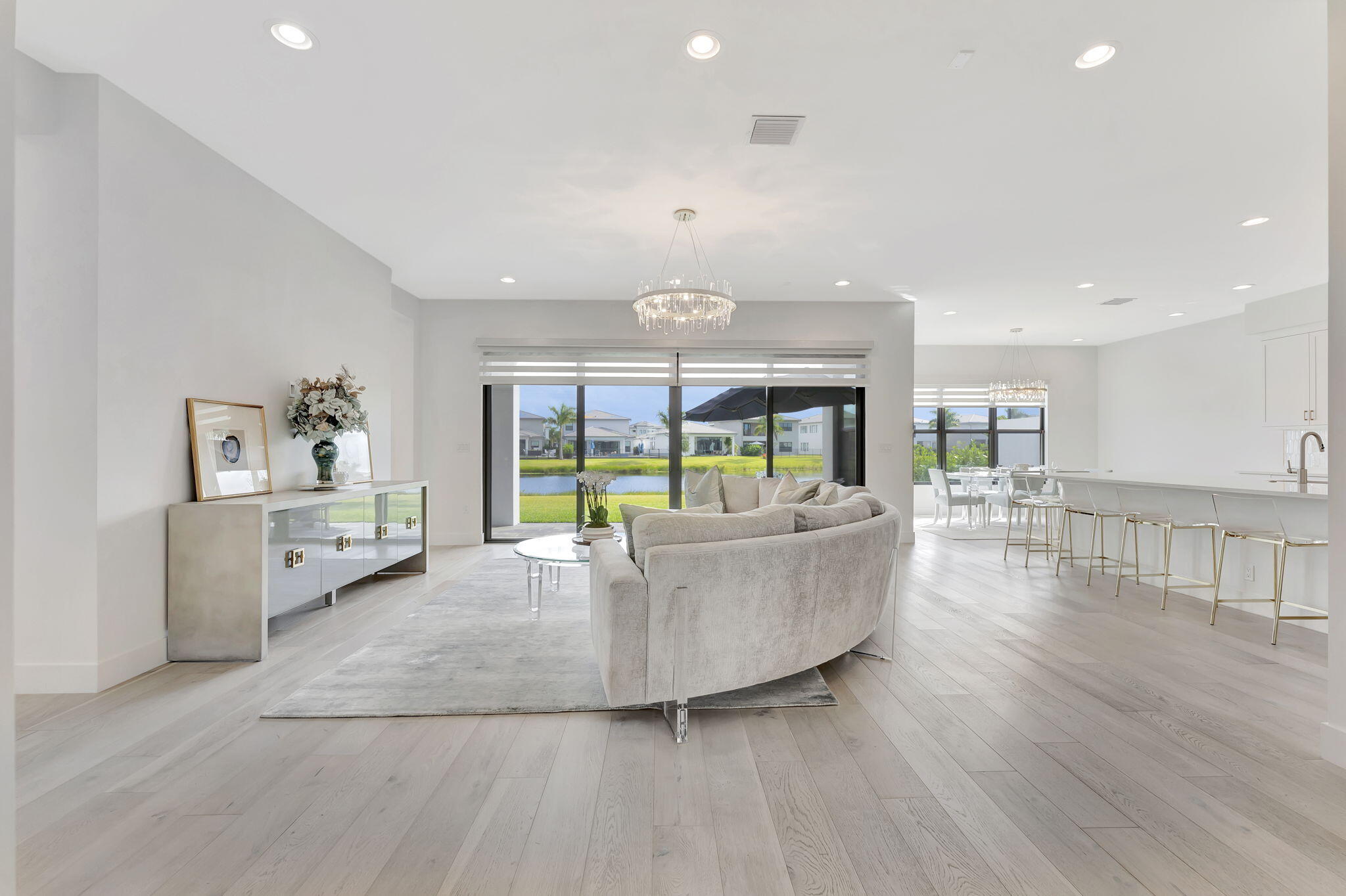 20046 Pacific Dunes Drive Boca Raton, FL 33434 - Photo 10 of 130 a living room with furniture and a large window