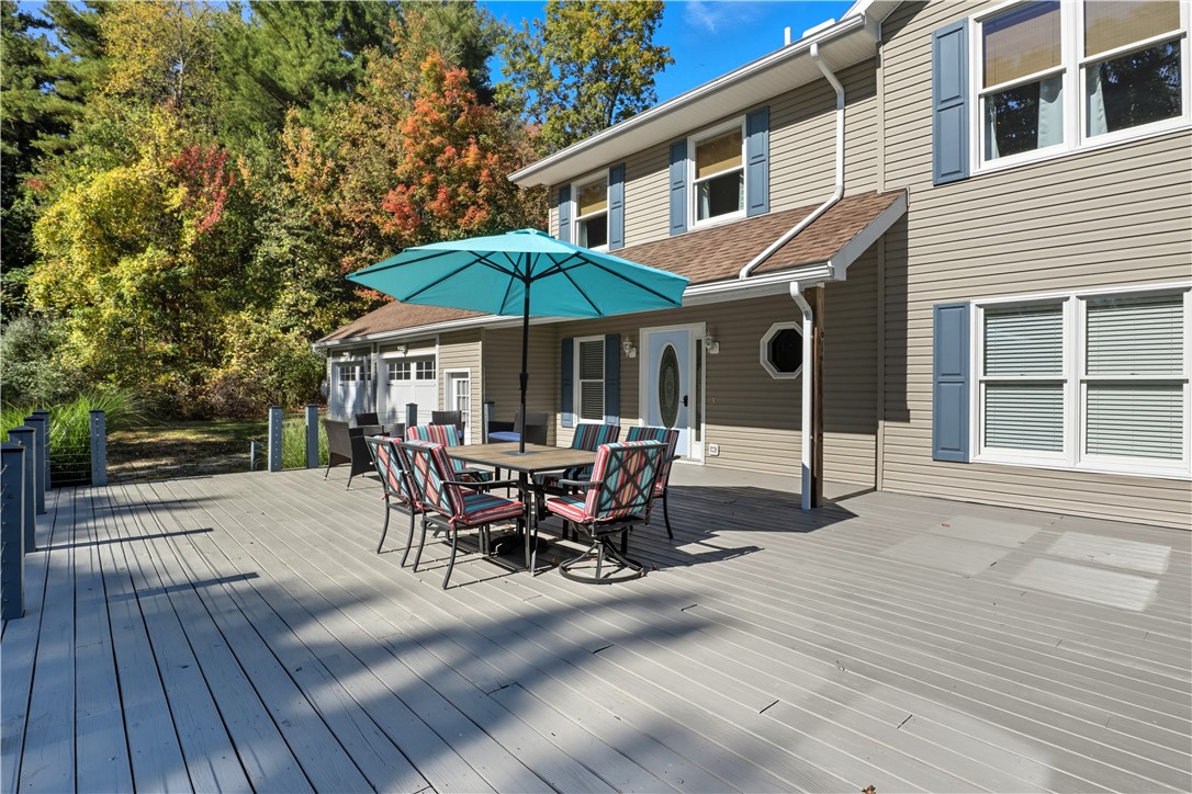 6650 Seman Road Naples, NY 14512 - Photo 36 of 48 Large front deck faces the mature trees.
