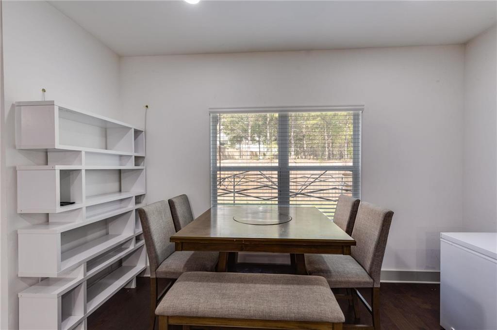 245 Crestbrook Lane Dallas, GA 30157 - Photo 17 of 47 a view of a room with wooden floor and windows