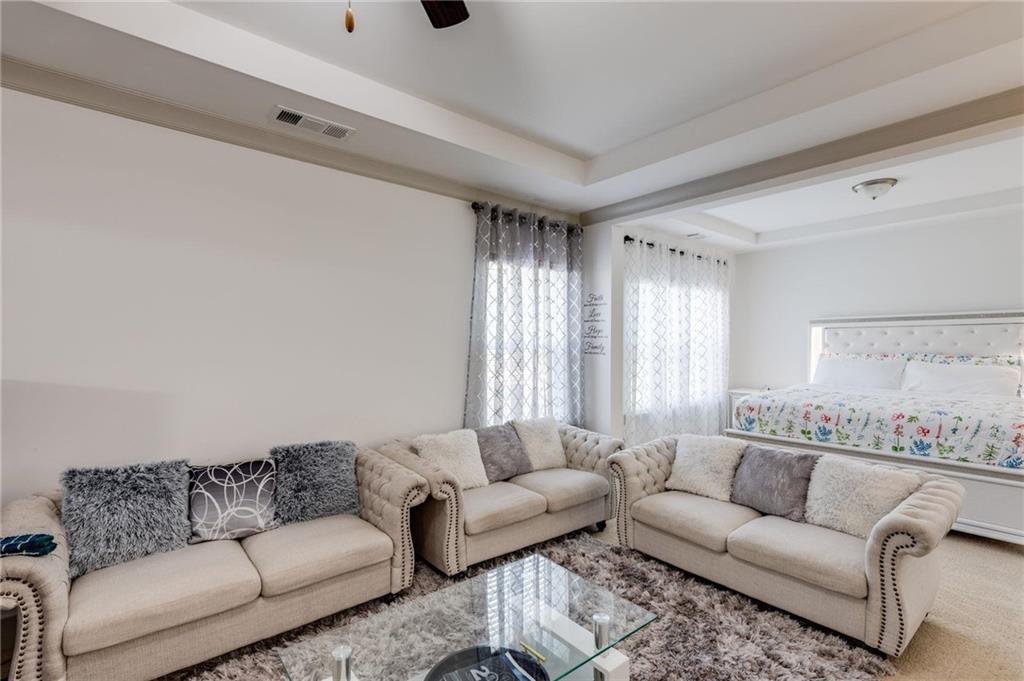 245 Crestbrook Lane Dallas, GA 30157 - Photo 22 of 47 a living room with furniture and a large window