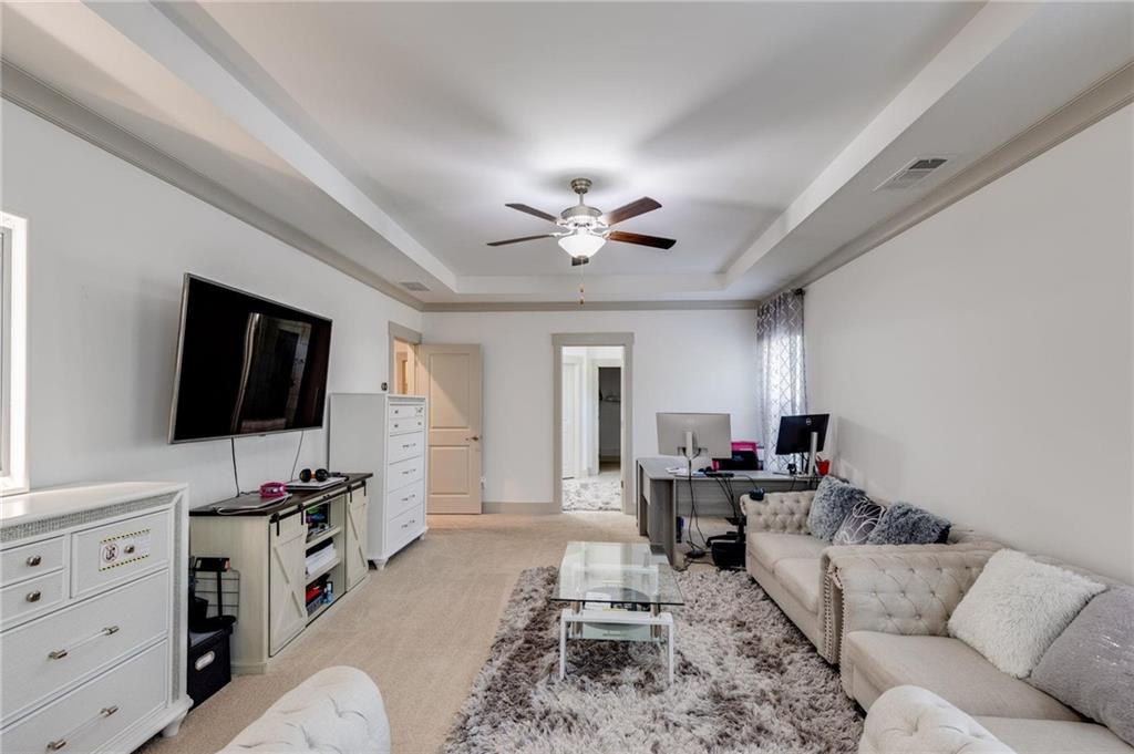 245 Crestbrook Lane Dallas, GA 30157 - Photo 24 of 47 a living room with furniture and a flat screen tv