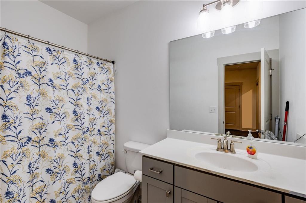 245 Crestbrook Lane Dallas, GA 30157 - Photo 29 of 47 a bathroom with a sink toilet and shower