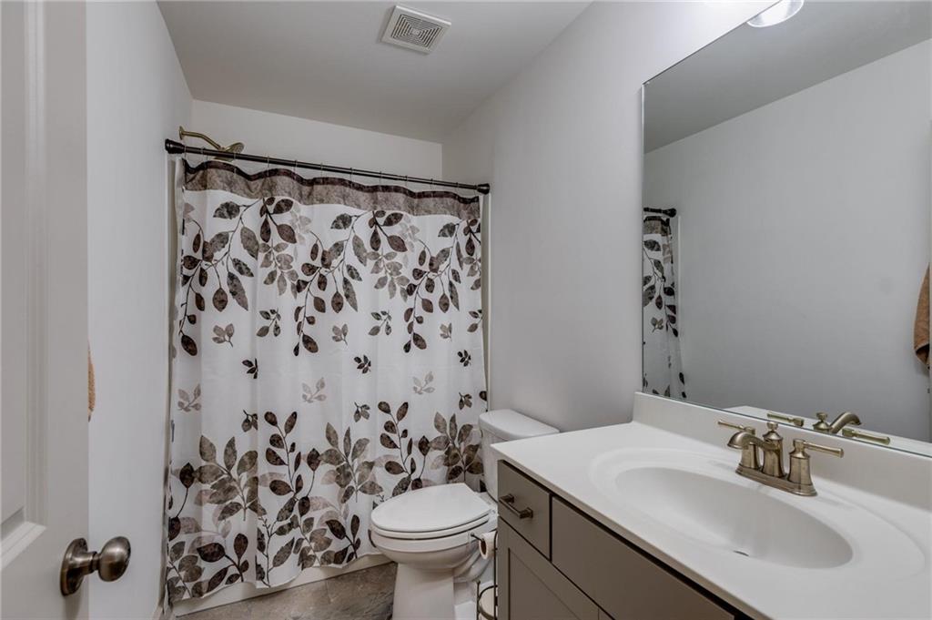 245 Crestbrook Lane Dallas, GA 30157 - Photo 34 of 47 a bathroom with a sink toilet and shower