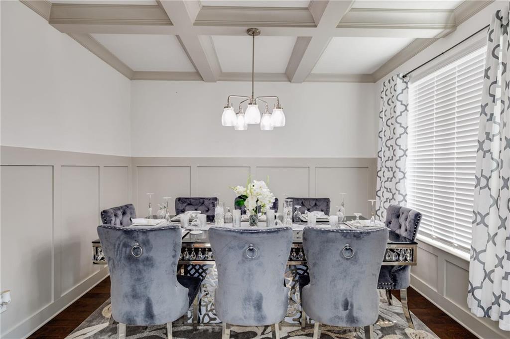 245 Crestbrook Lane Dallas, GA 30157 - Photo 10 of 47 a view of a dining room with furniture and chandelier