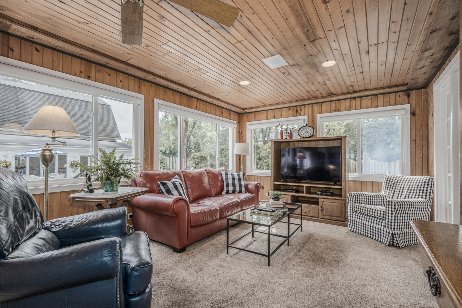 1530 Kaneville Road Geneva, IL 60134 - Photo 15 of 60 a living room with furniture a flat screen tv and a large window