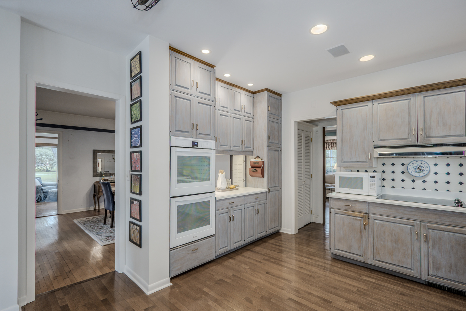 1530 Kaneville Road Geneva, IL 60134 - Photo 20 of 60 a kitchen with stainless steel appliances a refrigerator and a stove top oven