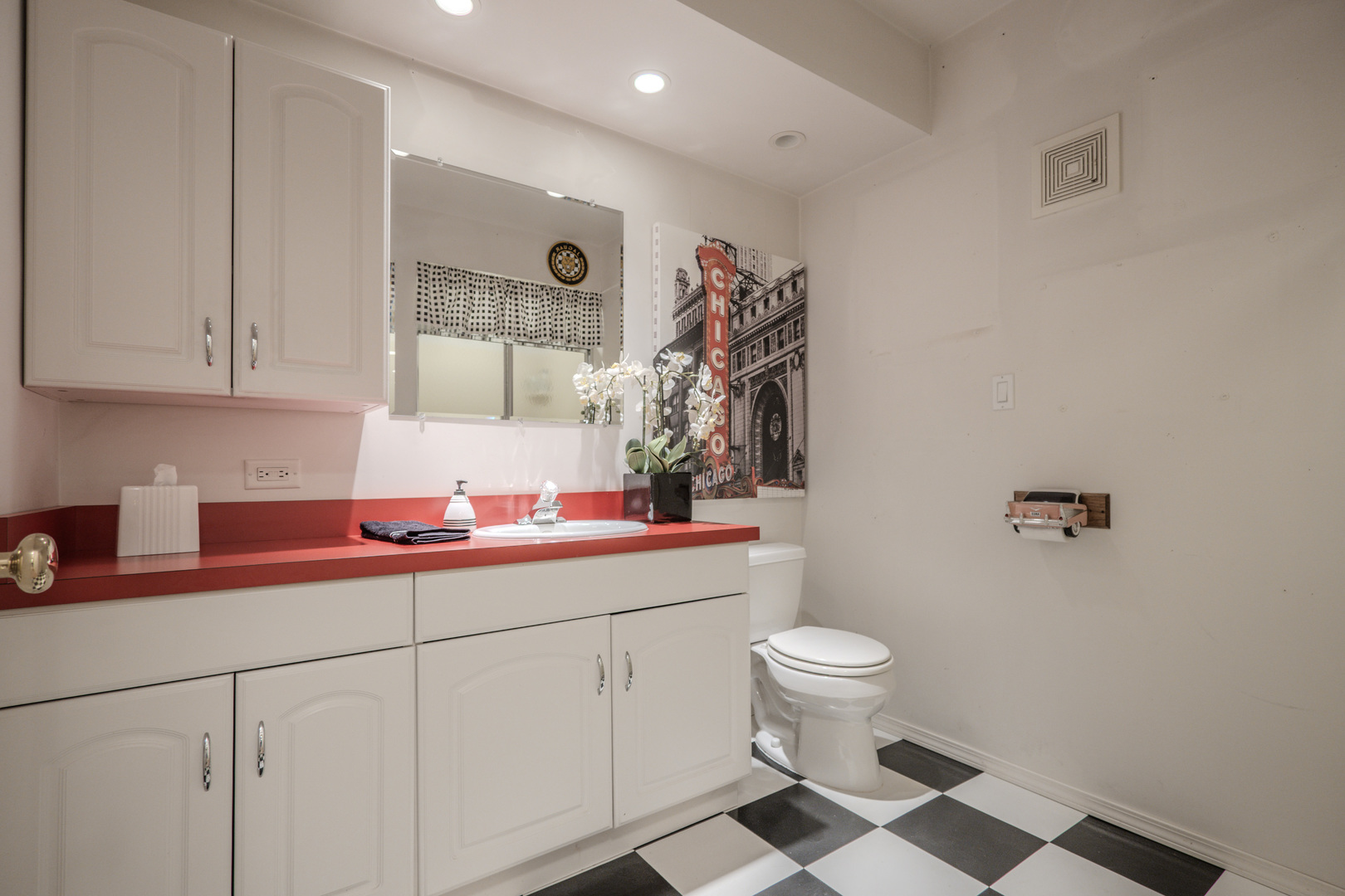 1530 Kaneville Road Geneva, IL 60134 - Photo 43 of 60 a bathroom with a sink a toilet and a mirror