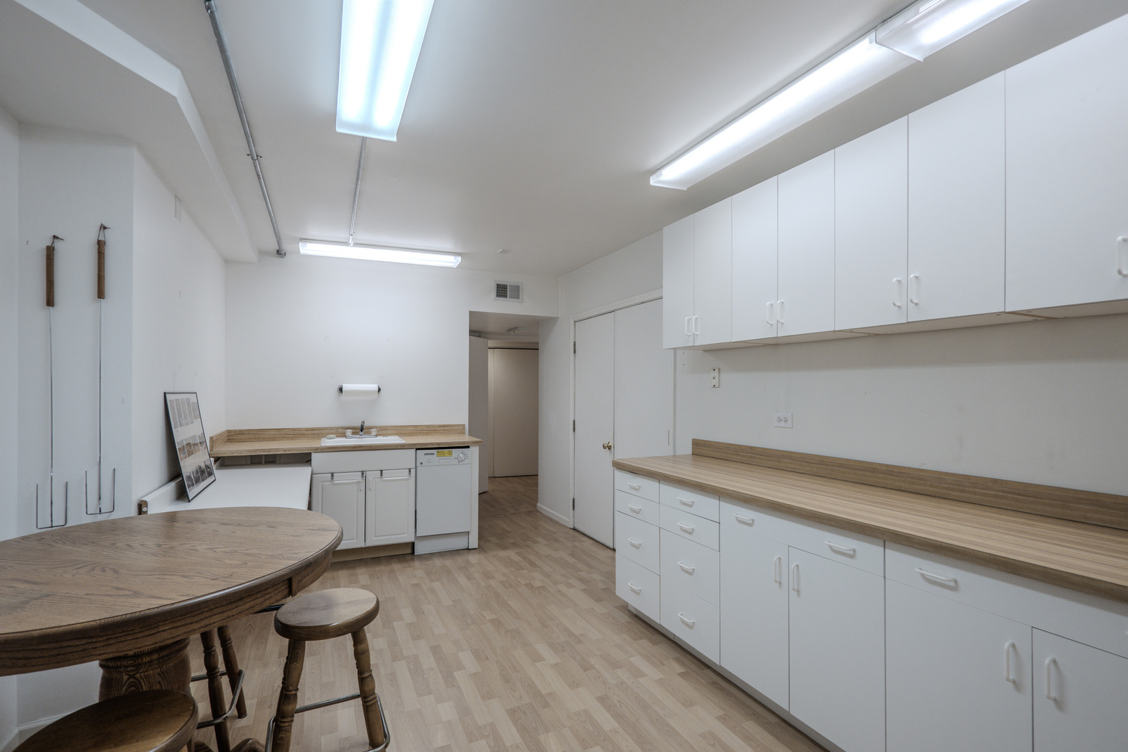 1530 Kaneville Road Geneva, IL 60134 - Photo 44 of 60 a kitchen with a table chairs sink and cabinets