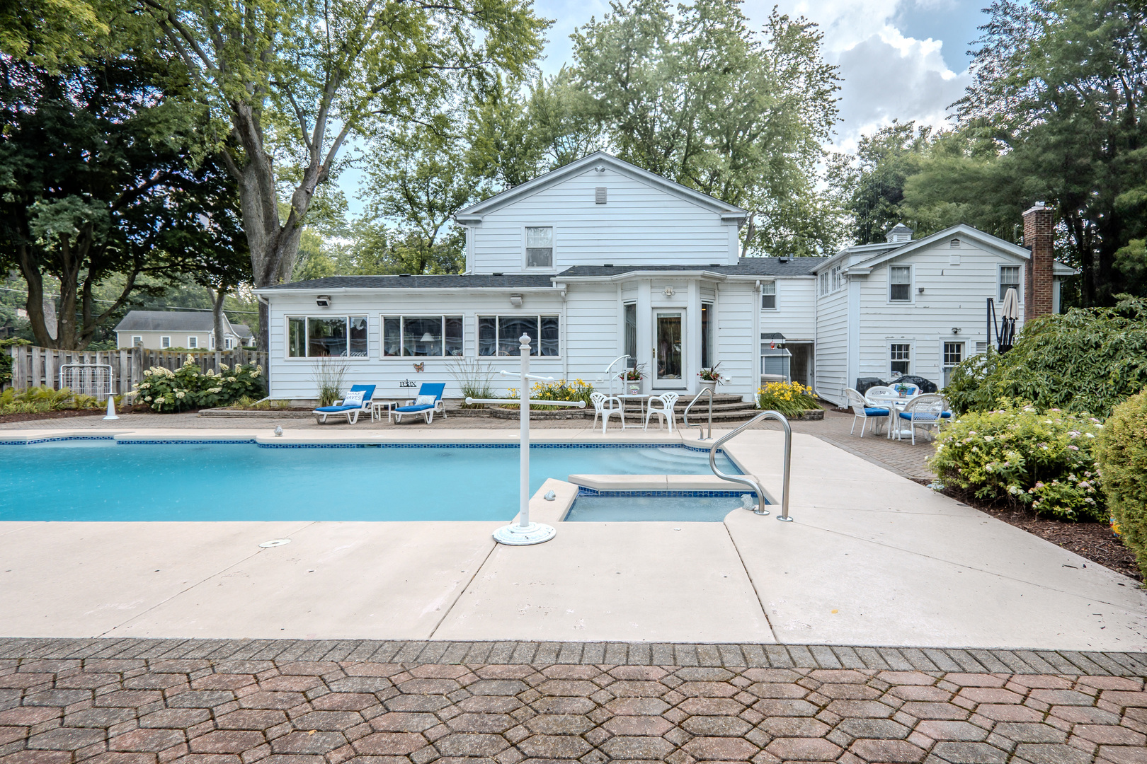 1530 Kaneville Road Geneva, IL 60134 - Photo 48 of 60 a patio with couches and a table and chairs with potted plants