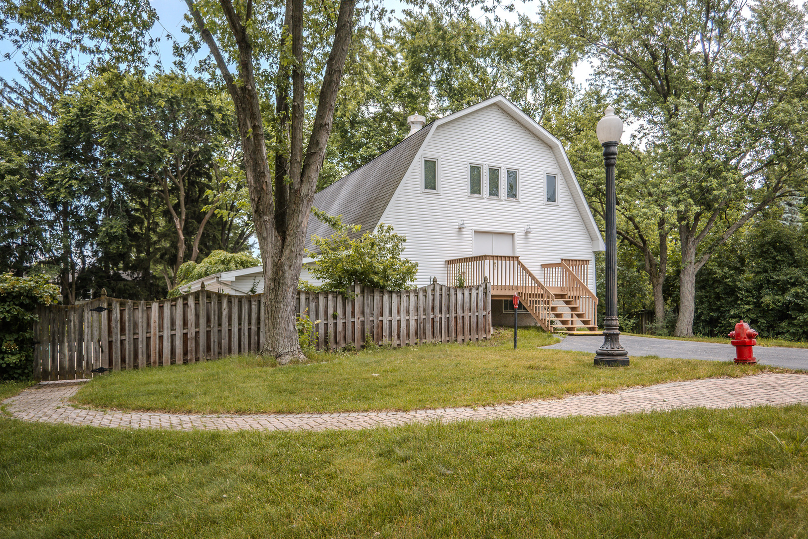 1530 Kaneville Road Geneva, IL 60134 - Photo 50 of 60 a view of a house with a yard and fence