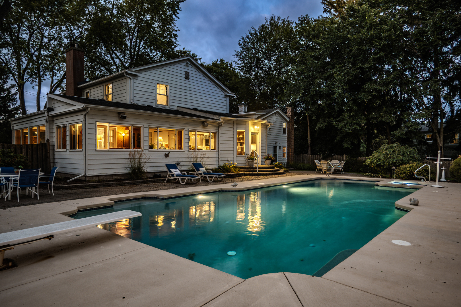 1530 Kaneville Road Geneva, IL 60134 - Photo 53 of 60 a front view of a house with swimming pool having outdoor seating