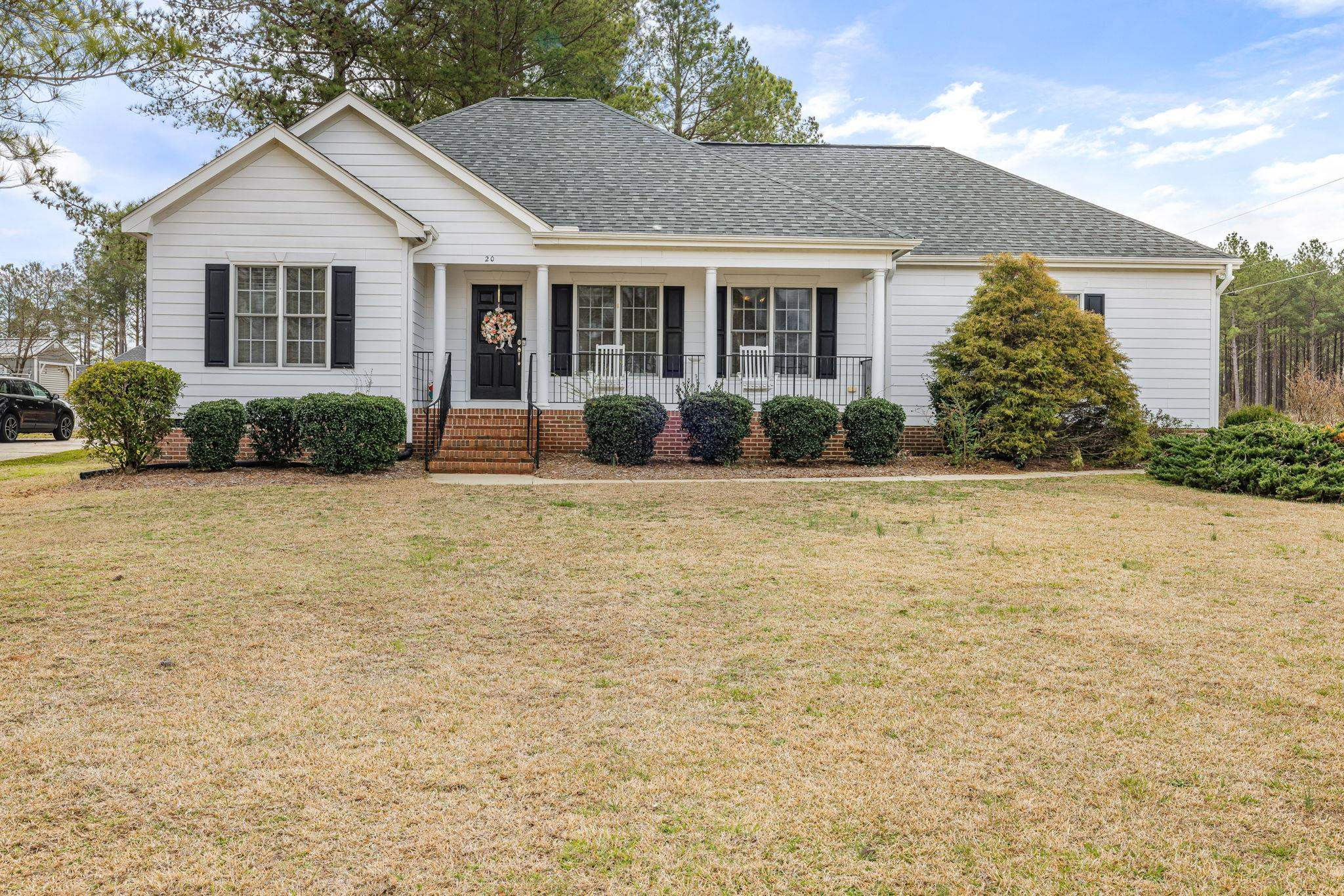 20 Crestline Drive Selma, NC 27576 - Photo 1 of 40 a view of a house with yard and plants