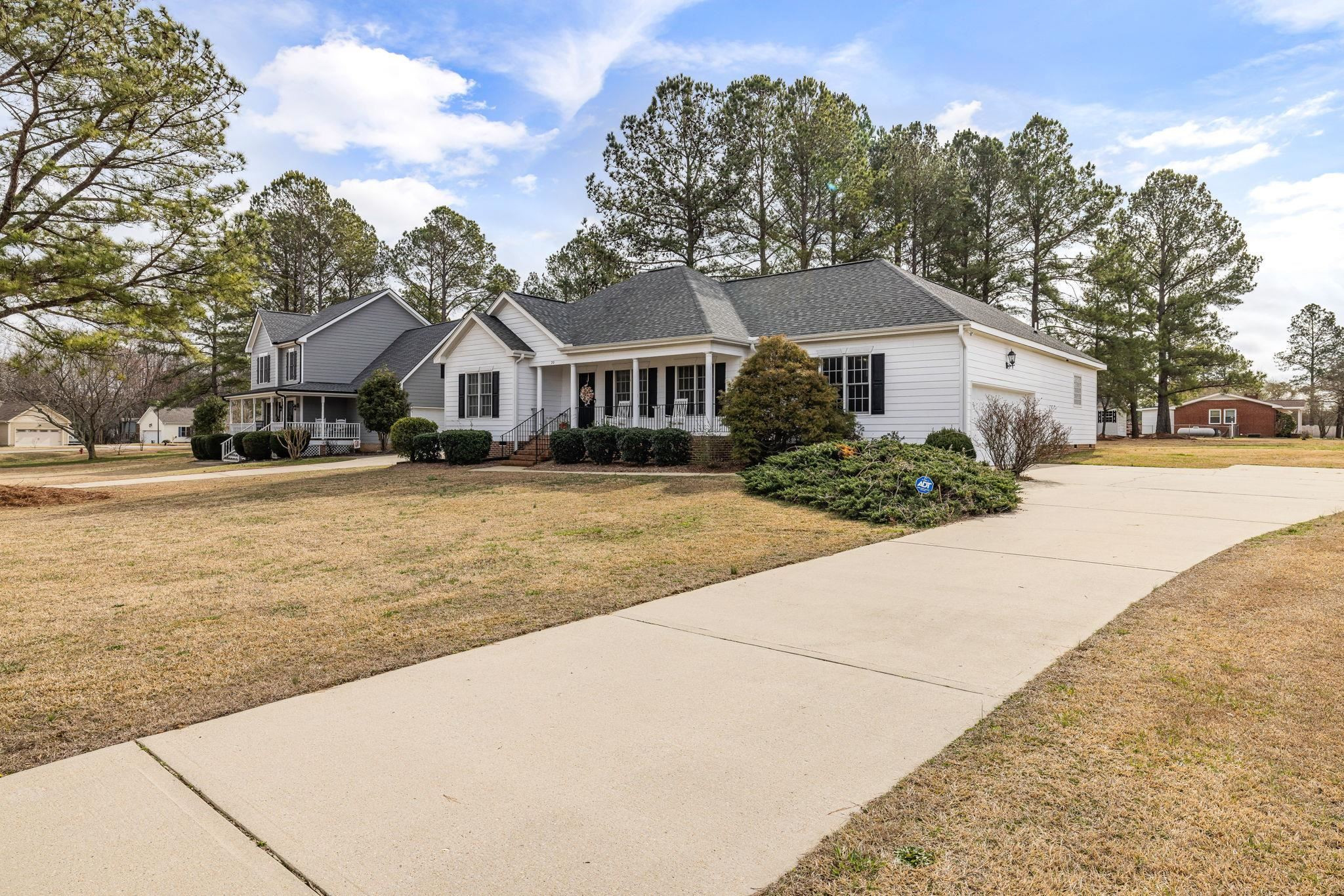 20 Crestline Drive Selma, NC 27576 - Photo 2 of 40 a front view of a house with a yard