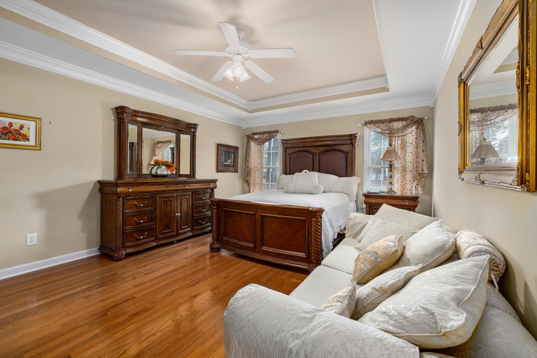 20 Crestline Drive Selma, NC 27576 - Photo 26 of 40 a bed room with furniture and a fireplace