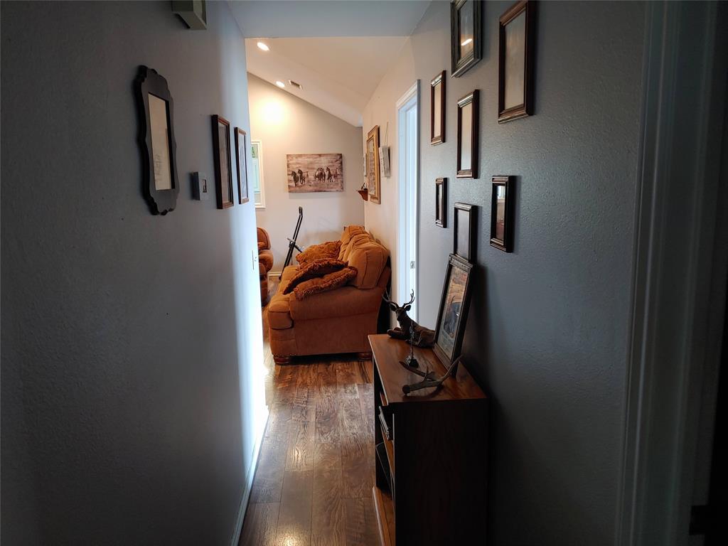 84 County Road Sumner, TX 75486 - Photo 17 of 33 a view of walk in closet with clothes and shoes