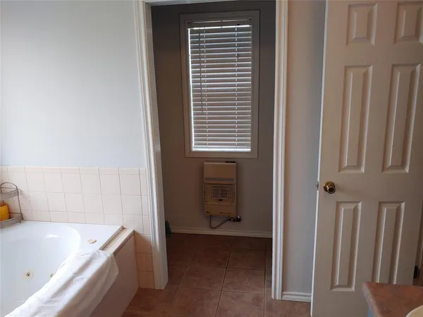 a bathroom with a shower curtain