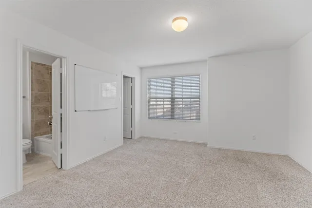 a view of a livingroom with a staircase