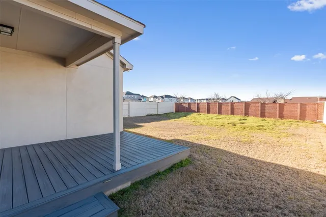 a view of swimming pool from a balcony