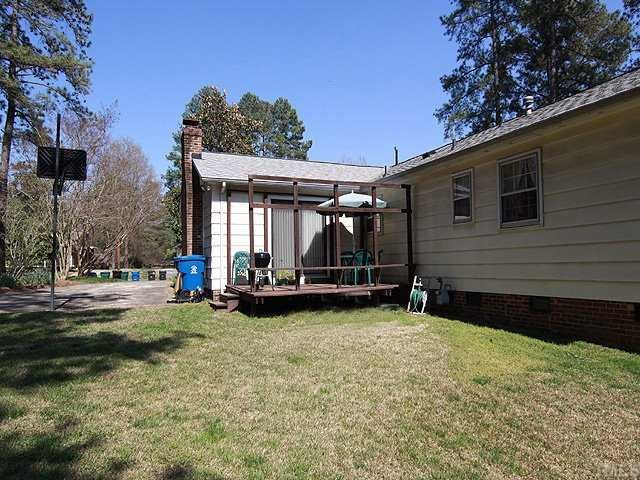 1343 Sedwick Road Durham, NC 27713 - Photo 12 of 14 Deck for grilling. Basketball goal at end of driveway. Patio/Deck
