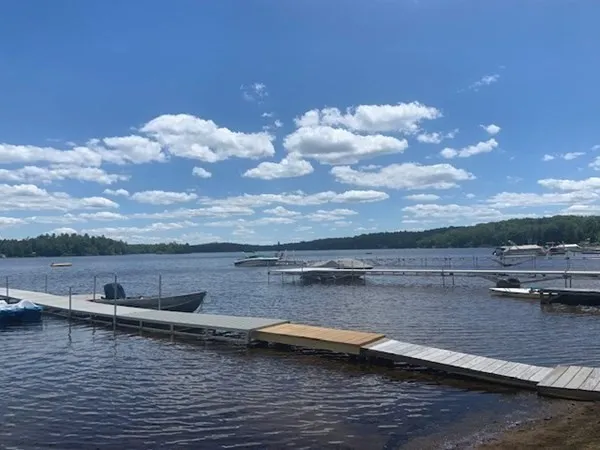 a view of swimming pool with outdoor seating