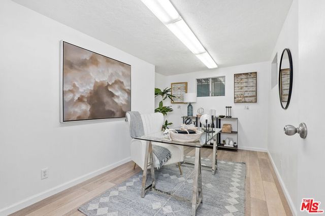 a view of a workspace with furniture