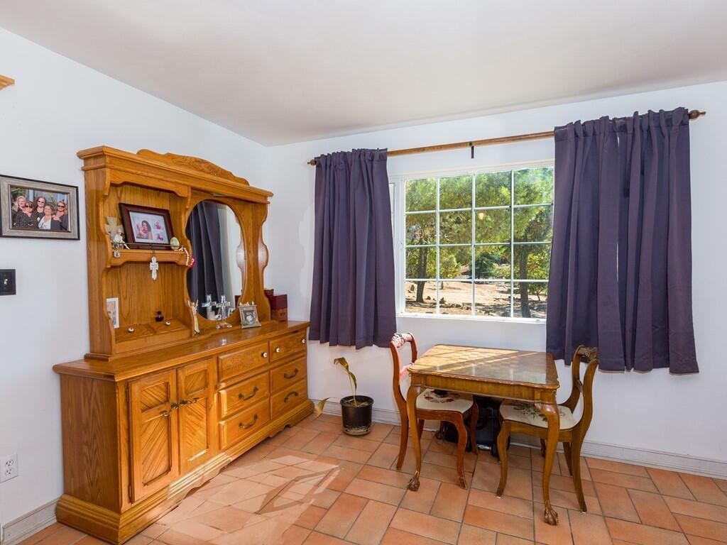 35269 Red Rover Mine Road Acton, CA 93510 - Photo 11 of 19 a dining room with furniture and window