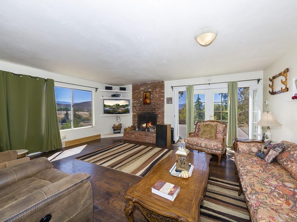 35269 Red Rover Mine Road Acton, CA 93510 - Photo 6 of 19 a living room with furniture and a fireplace