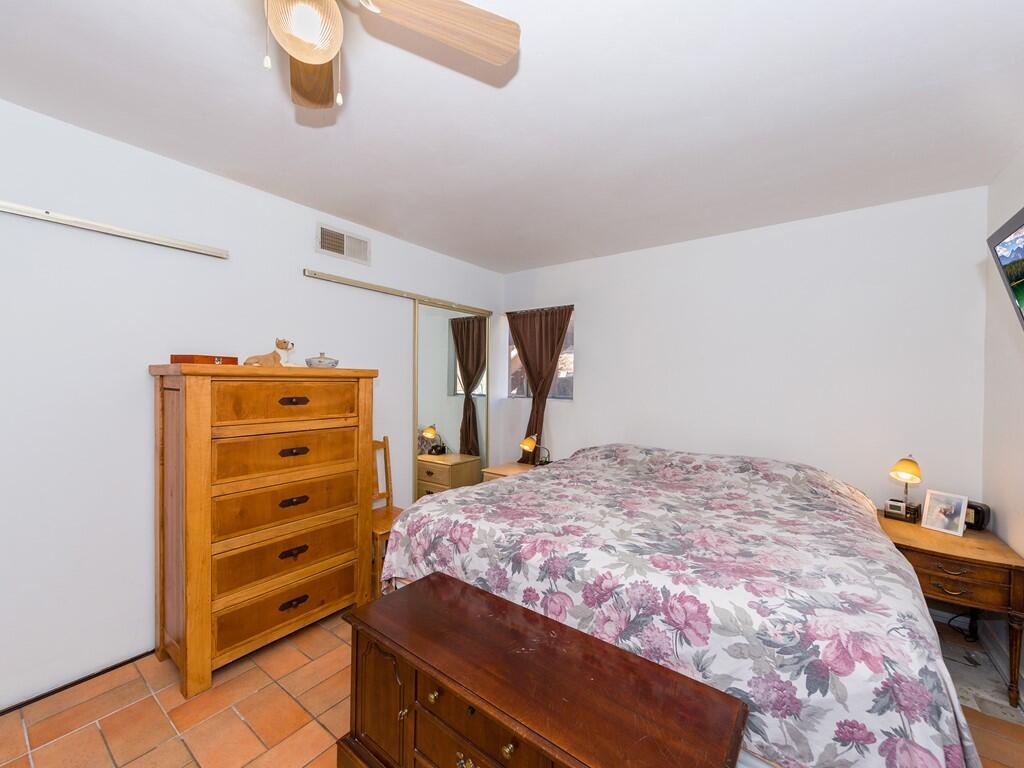 35269 Red Rover Mine Road Acton, CA 93510 - Photo 10 of 19 a bedroom with a bed and cabinets