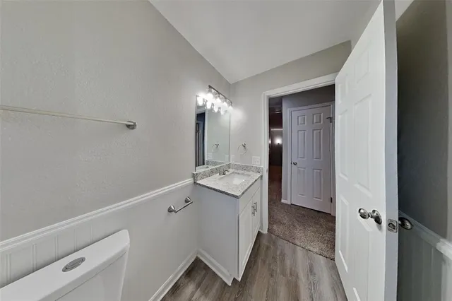 a bathroom with a sink and mirror