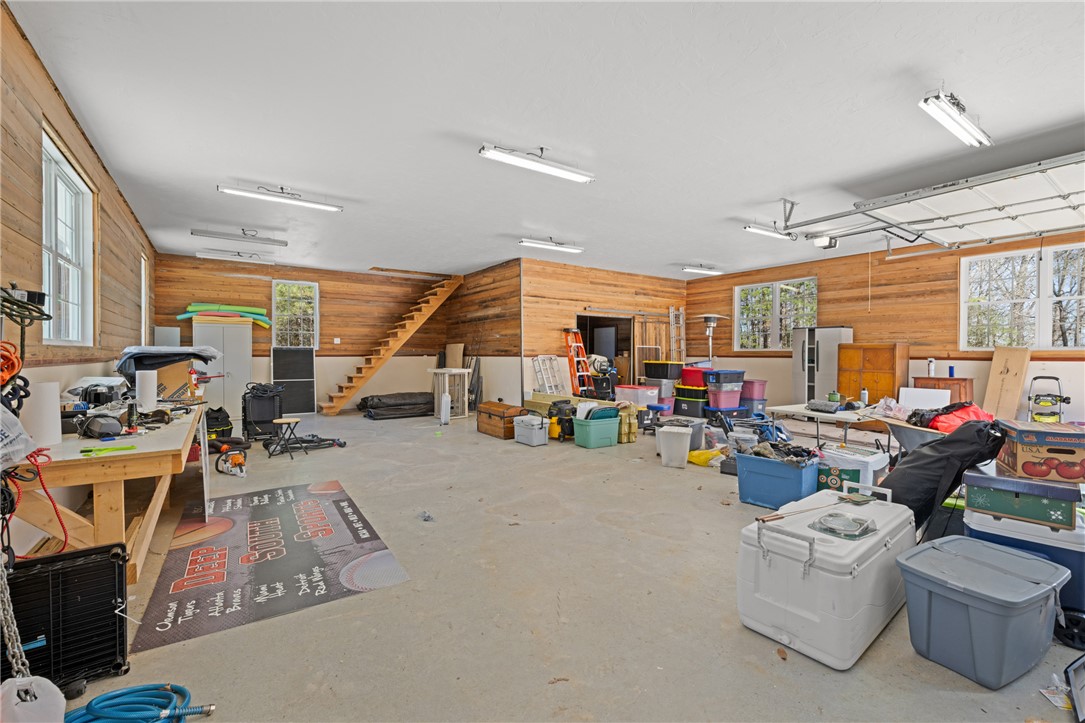204 Riverlake Road Fair Play, SC 29643 - Photo 41 of 50 This expansive garage space offers abundant storage and functional utility for various needs.