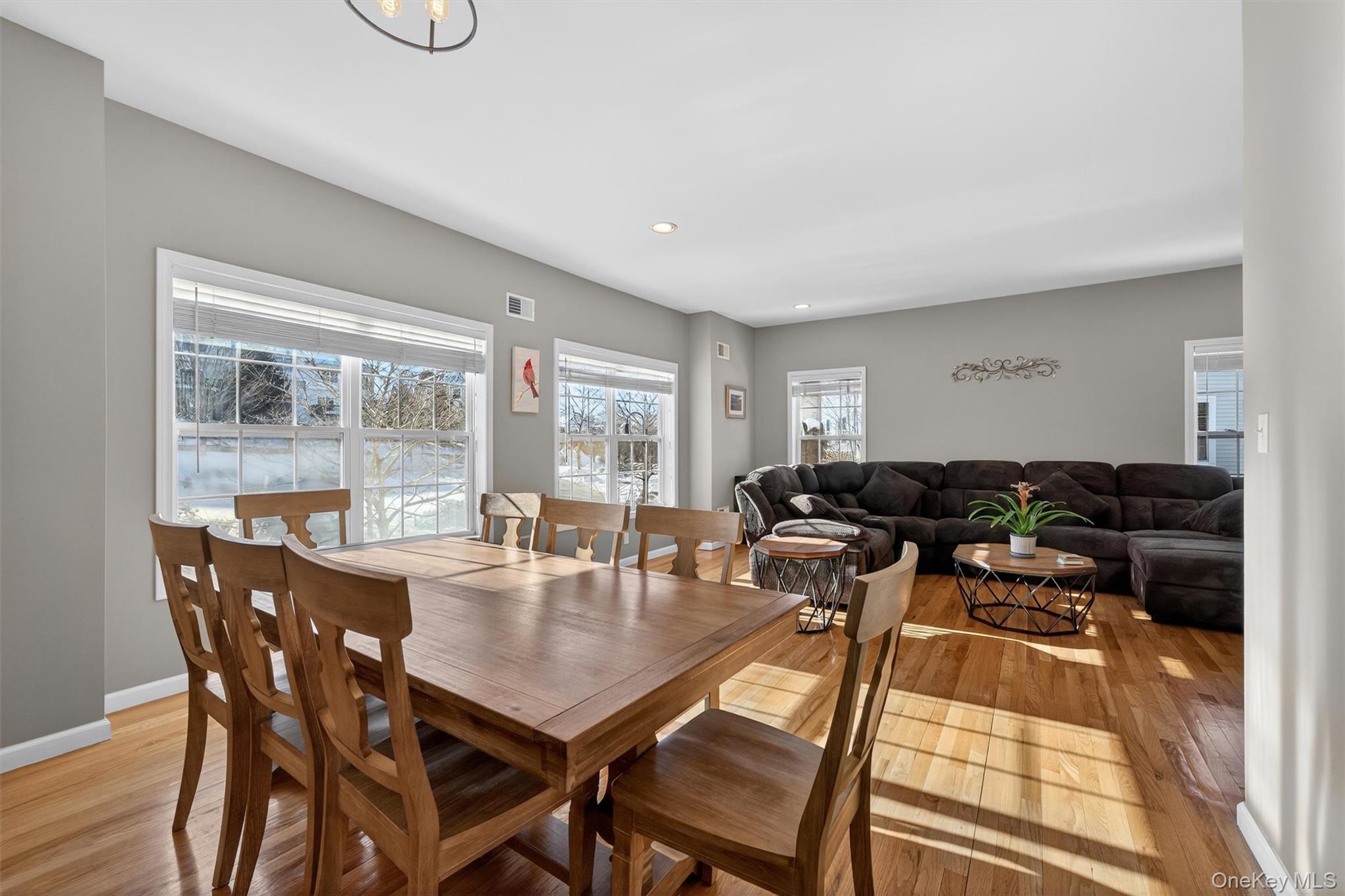 32 Peter Turner Road Monroe, NY 10950 - Photo 12 of 42 a view of a dining room with furniture wooden floor and a rug