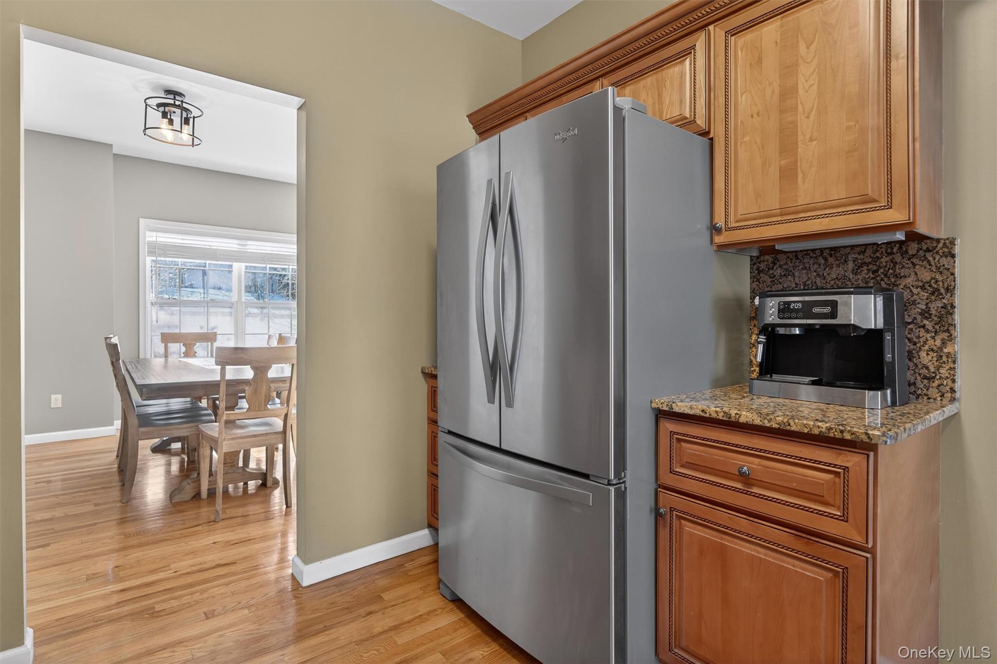 32 Peter Turner Road Monroe, NY 10950 - Photo 15 of 42 a kitchen with granite countertop a refrigerator and a stove top oven
