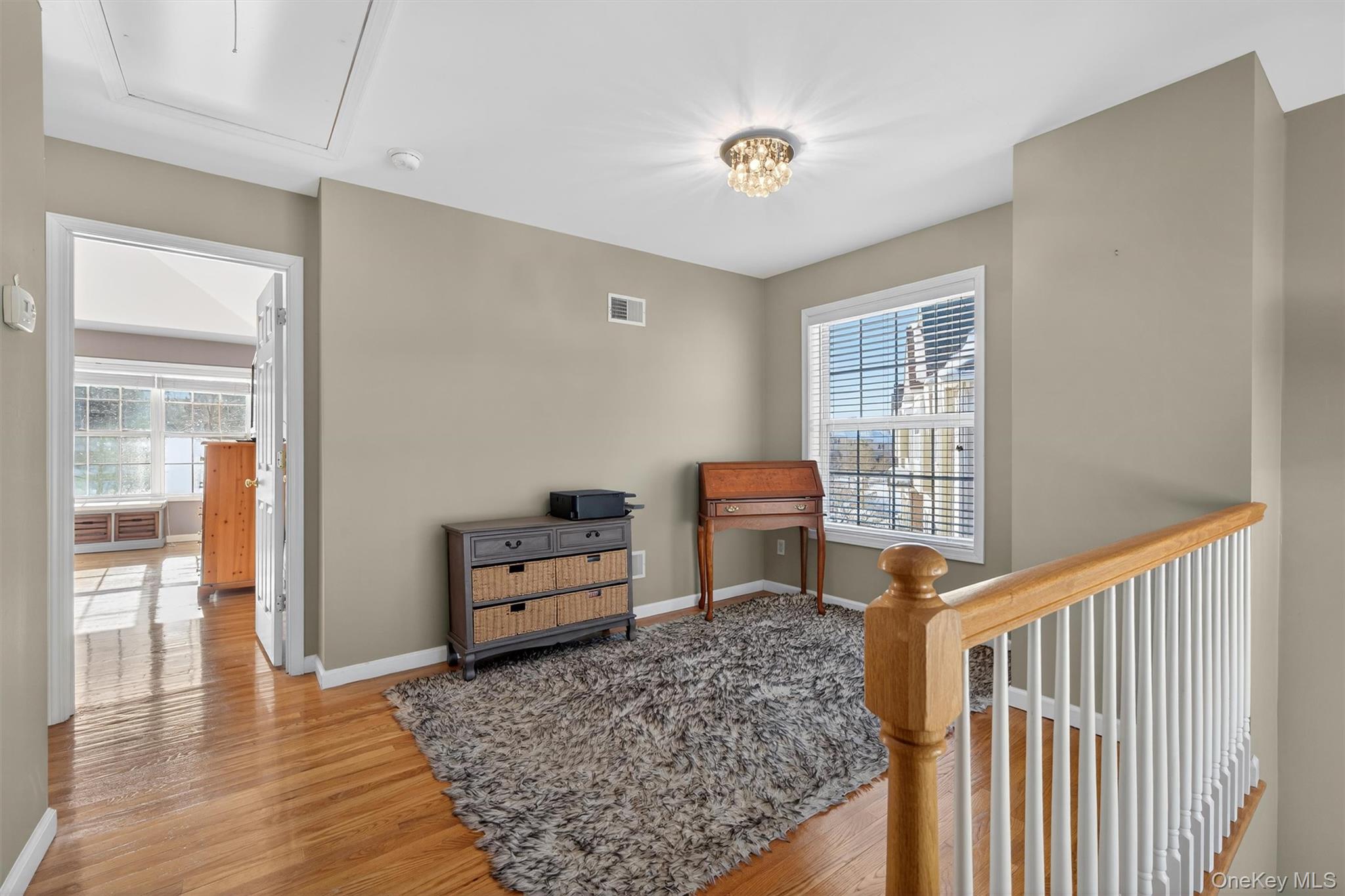 32 Peter Turner Road Monroe, NY 10950 - Photo 22 of 42 a view of a bedroom with furniture and wooden floor