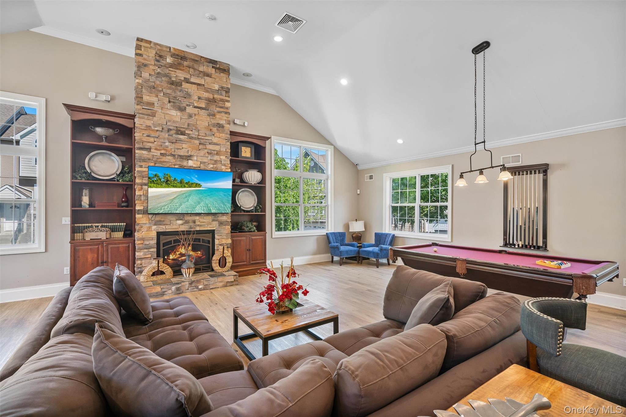 32 Peter Turner Road Monroe, NY 10950 - Photo 40 of 42 a living room with furniture a fireplace and a floor to ceiling window