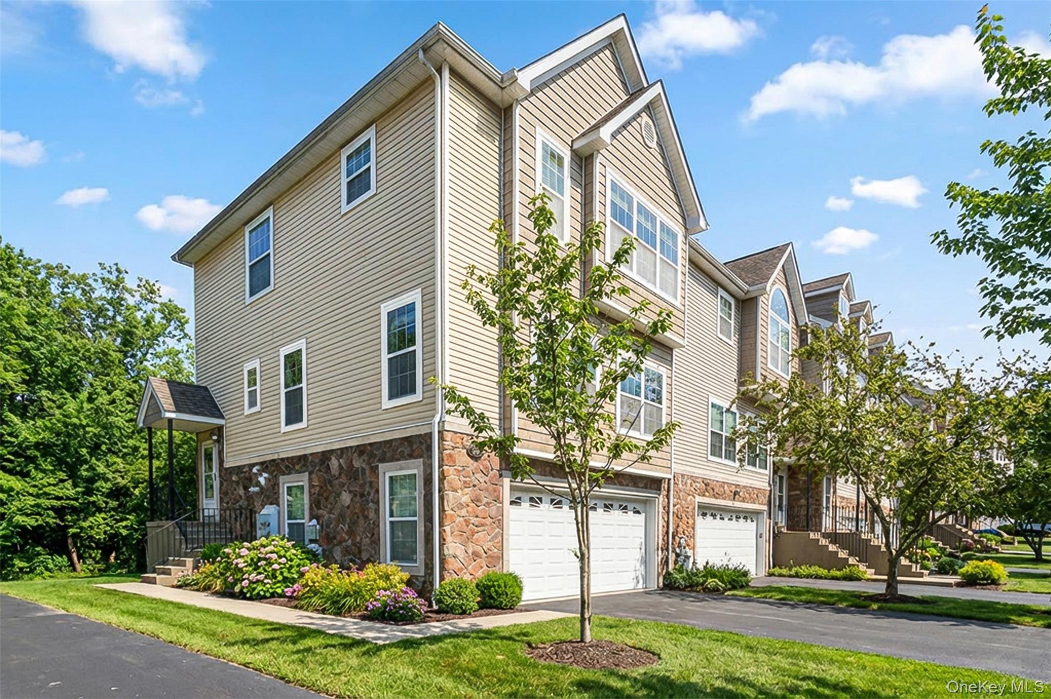 32 Peter Turner Road Monroe, NY 10950 - Photo 4 of 42 a front view of a house with garden
