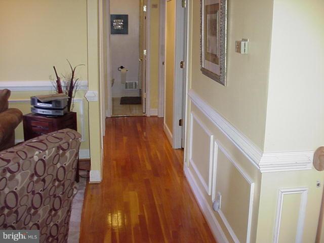 9017 Bruno Road Randallstown, MD 21133 - Photo 8 of 18 Hallway leading to Sleeping Quarters Plus Gleaming