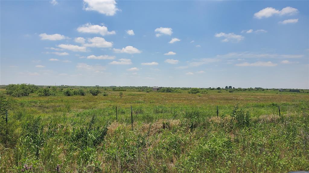 0 Campbell Bellevue, TX 76228 - Photo 8 of 9 a view of a lake and green valley