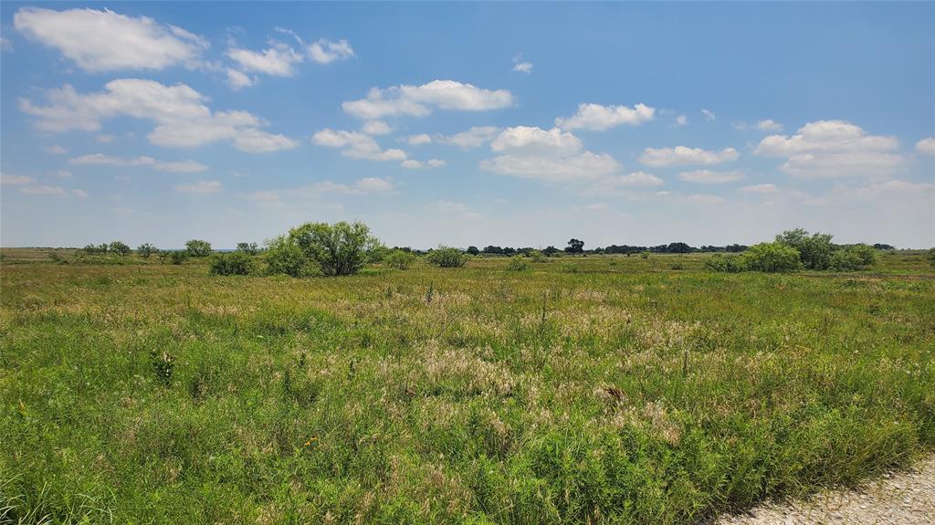 0 Campbell Bellevue, TX 76228 - Photo 9 of 9 a view of a lake with houses in the back